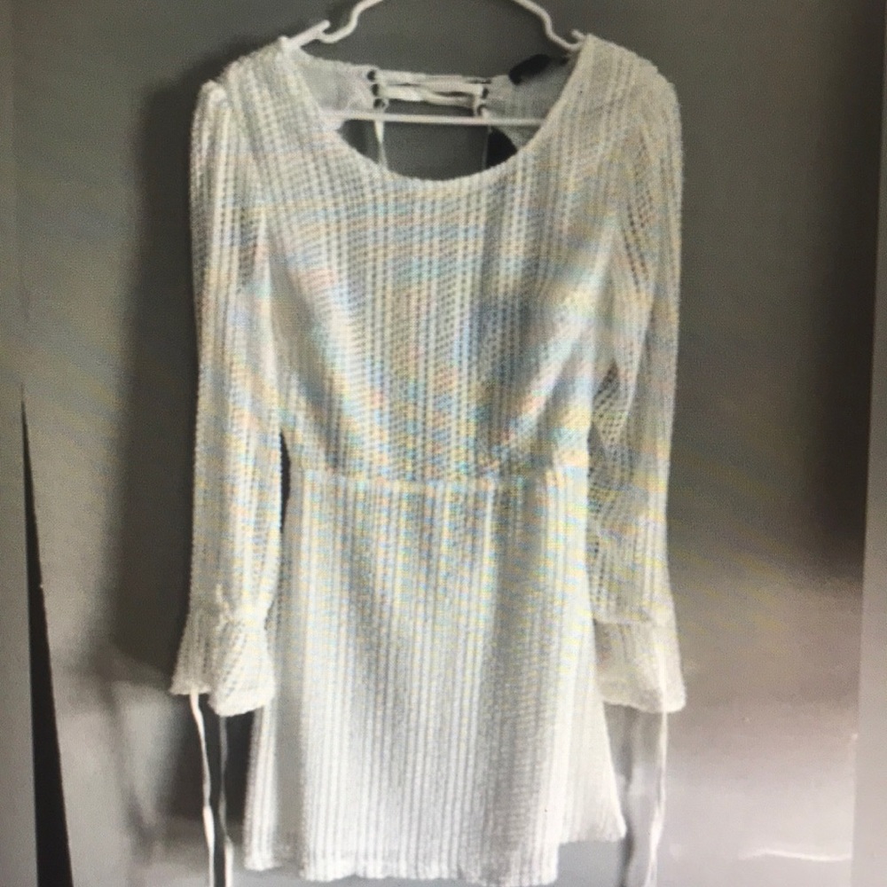 Suzanne entro white dress